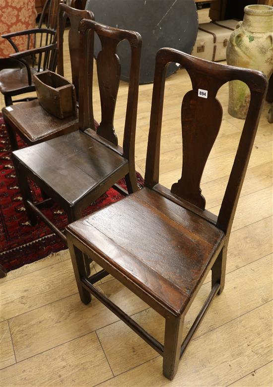 Three mid 18th century oak dining chairs and a box